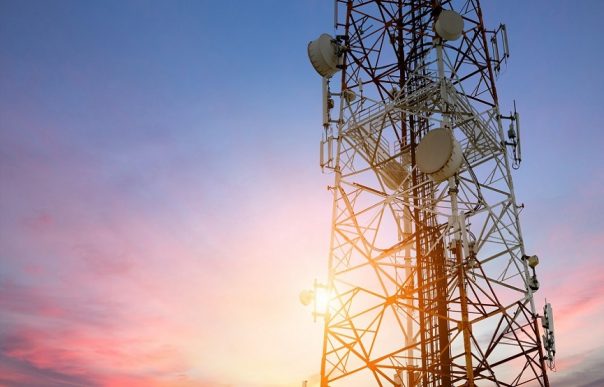 Satellite dish telecom network at sunset communication technolog